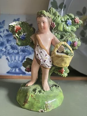 Buy A Staffordshire Pearlware Figure Of  A Putto, Circa 1820 • 12£