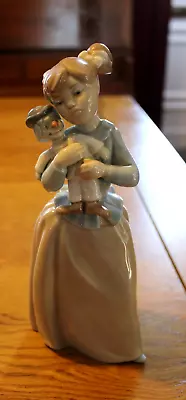 Buy NAO Porcelain Figurine 'GIRL HOLDING TOY CLOWN' • 6.50£
