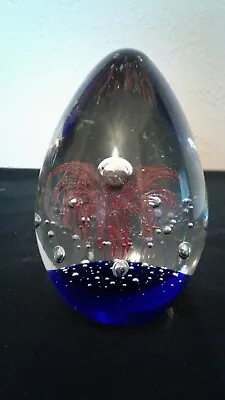 Buy Oval Pink And Blue Starburst Flower Glass Paperweight  • 3.99£