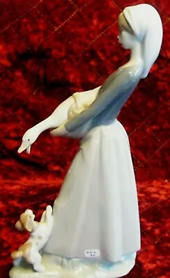 Buy Lladro Girl Holding Goose With Dog . 27 Cms • 48£