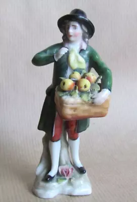 Buy Dresden Small Figurine Of A Boy Holding A Basket Of Fruit  (10421) • 29.25£