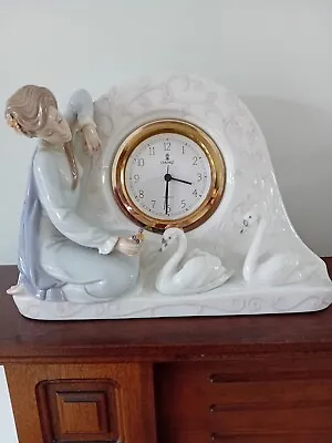 Buy Lladro SWAN CLOCK (5777), First Quality, Girl Holding Flowers. Mint, GWO.  • 95£