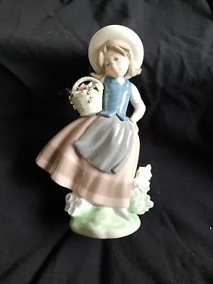 Buy A LLADRO  Figurine Of A Girl Holding A Basket Of Beautiful Flowers • 8.99£