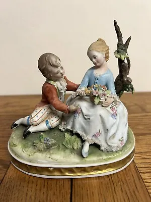 Buy Capodimonte Porcelain Figural Girl & Boy Seated On A Tree Branch Back Stamped • 52.99£