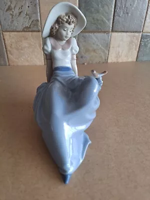 Buy Nao  By Lladro Of A Girl Sitting On A Rock With A Bird On Her Left Knee • 5.50£