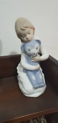 Buy NAO Lladro Girl Holding Blue Teddy Bear Figurine Perfect Condition  • 20£