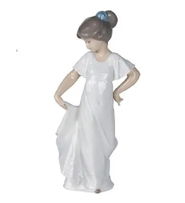 Buy Nao Porcelain By Lladro Figurine How Pretty 2001110 Was £55 Now £49.50 • 49.50£