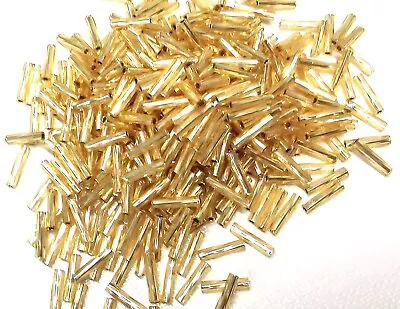 Buy 20gms Matsuno 9mm Bugle Beads - Colour 33-TW Pale Gold - Silver Lined • 1.80£