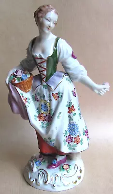 Buy DRESDEN PORCELAIN FIGURE OF A WOMAN CARRYING A BASKET OF FLOWERS (Ref9861) • 90£