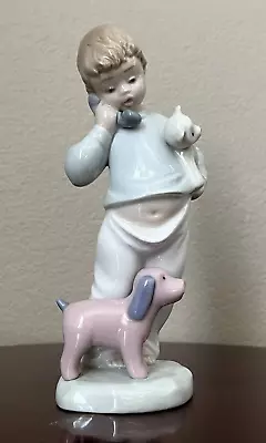 Buy NAO By Lladro “Hello Mommy” Boy On Phone With Dog And Teddy Bear • 23.90£