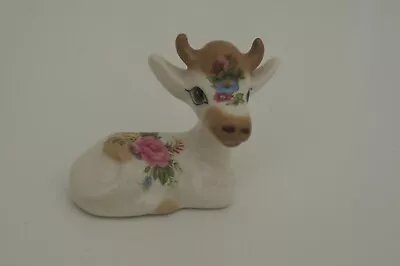 Buy Tiny Szeiler Floral Laying Cow • 9£