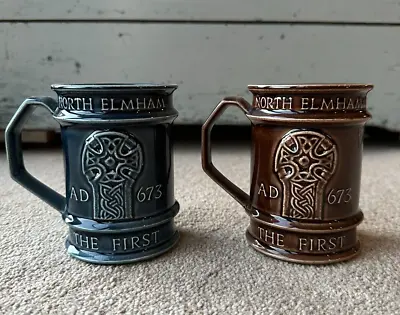 Buy Holkham Pottery Pair Of Blue/Brown Commemorative Mugs North Elmham AD 673 - 1973 • 25£