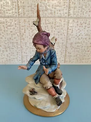 Buy Capodimonte Figurine Of Boy Sitting By An Open Fire • 4.99£