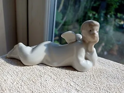 Buy Cherub Nao By Lladro Porcelain Angel Laying Down Figurine Angel Boy Figure  • 12.99£