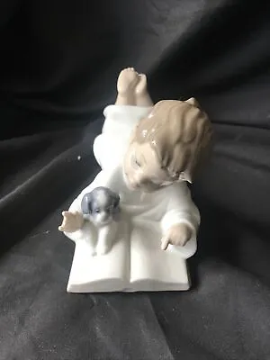 Buy Nao By Lladro Figurine No. 1285 - Boy Lying Down With Book And Puppy - VGC • 14.99£