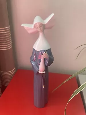 Buy Lladro Porcelain Figurine 5550 Blue Nun Hold Purple Flower Vase • 30£