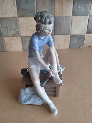 Buy Nao By Lladro Figurine Of A  Tennis Player Tying Shoelaces Whilst Sitting Down • 6.50£