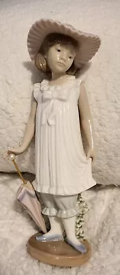 Buy Nao By Lladro Girl With Umbrella- April Showers. • 8£