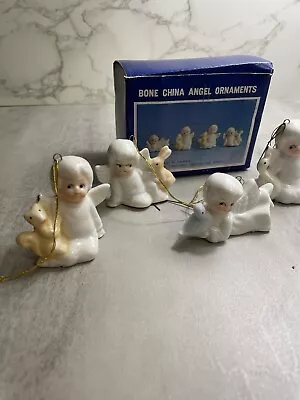 Buy VNTG Miniature Bone China Angel Ornaments 4 Pieces Christmas Around The World • 14.21£