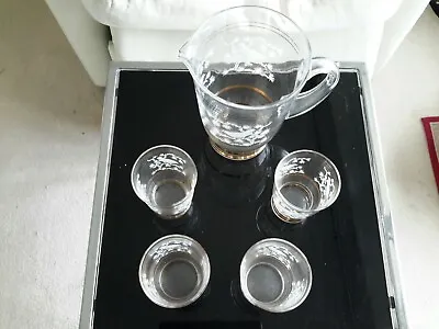 Buy 1950s VINTAGE WATER JUG AND SET OF SIX GLASSES DECORATED WITH GOLD LEAF AND BIRD • 10£