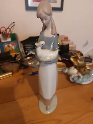 Buy NAO By Lladro No. 25 “Shepherd Girl With Goose” Porcelain Figurine  • 5£