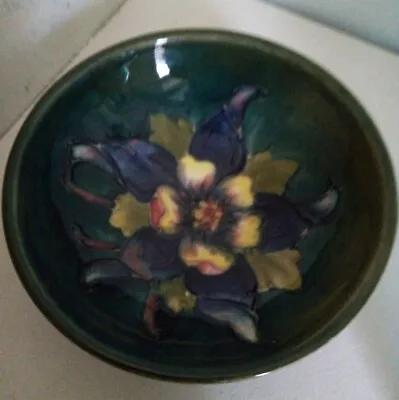 Buy Antique William Moorcroft  Tube Lined Bowl Dark Green Base Yellow & Purple Flora • 38£