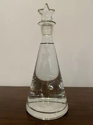Buy Stylish Glass Decanter With Star Shaped Stopper  • 12£