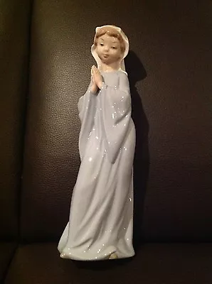 Buy Nao Girl - Praying Nun • 22.50£