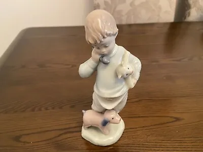 Buy NAO By  Lladro -  boy On Phone With Dog #1044 • 20£