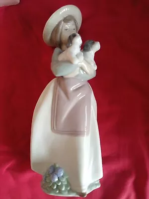 Buy LLADRO NAO Figurine - WHAT AN ARMFUL - Girl Holding Two Puppies MODEL No. 1156 • 22.99£