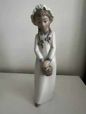 Buy Dao, Daisa A Girl Holding Flowers By Lladro Figurines • 10.99£