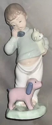 Buy Nao By Lladrò 'Boy On Phone With Dog And Teddy' Porcelain Figurine No. 1044 • 14.50£