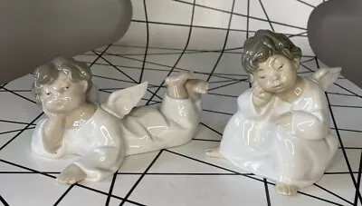 Buy Lladro Porcelain Figurines X 2   Angel Laying Down” & ‘Thinking Angel’ Cherub • 54.99£