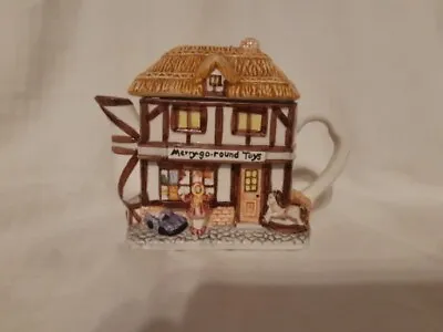 Buy Leonardo Novelty Cottage Ware Teapot Merry Go Round Toys Toy Shop Decorative  • 5£