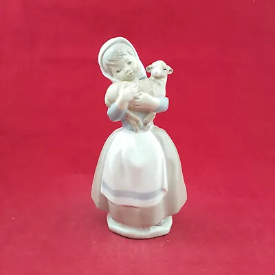 Buy Lladro Nao Figurine - Girl Holding Lamb In Arms 0120 - L/N 2921 • 32£