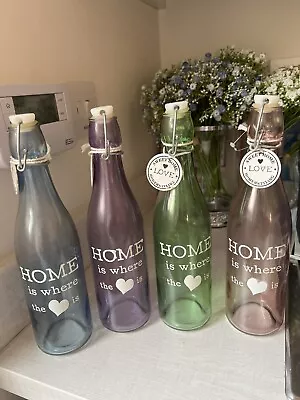 Buy 4 Decorative Glass Bottles. Blue, Green, Purple & Pink. Home Is Where The ❤️ Is • 12£