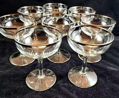 https://www.pips-trip.co.uk/img/lNoAAOSwCWFlPXSY/1950s-vintage-platinum-rim-champagne-glasses-crystal-set.webp