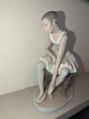 Buy Lladro NAO Figurine Elegant Ballet Ballerina Seated Putting On Slippers.  • 275£