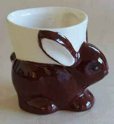 Buy Rabbit Egg Cup - Dark Brown Bunny With White Ears Seated White Egg Cup On Back  • 5£