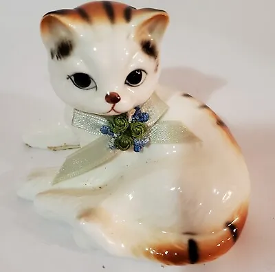 Buy Ceramic Cat Laying Down- Has Light Green And Blue Ribbon. • 17.37£