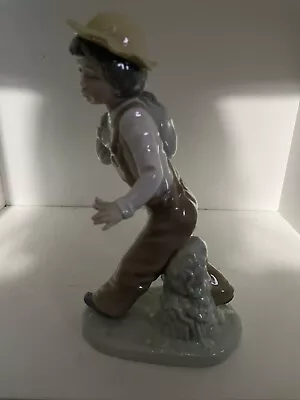 Buy Lladro Nao Figure - Boy Carrying Dog In Napsack  • 9.99£