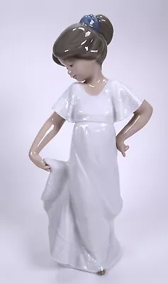 Buy NAO By Lladro Figurine  How Pretty  Girl Holding White Dress 1110 • 18£