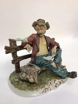 Buy Capodimonte Tramp Leaning Against A Fence Feeding Birds Large Figure • 25£