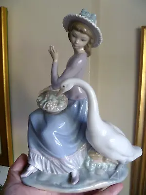 Buy Lladro Girl With Goose Trying To Eat From Her Basket Of Grapes • 60£