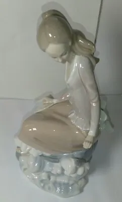 Buy Lladro Figurine AT THE SEASIDE GIRL SITTING ON ROCK WAVES FISH HAT #4918 • 118.74£