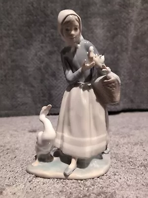 Buy Lladro Girl With A Duck And Carrying A Basket Of Ducklings • 15£