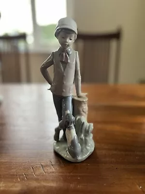 Buy Nao Lladro Figurines Boy With Dog • 25£