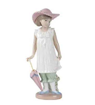 Buy Nao Porcelain By Lladro Figurine April Showers 2001126 Was £85.00 Now £76.50 • 76.50£